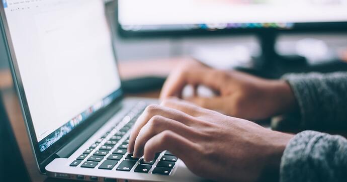 person using laptop internet